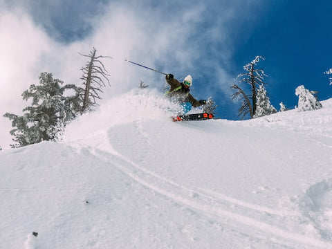 How should I ski moguls?