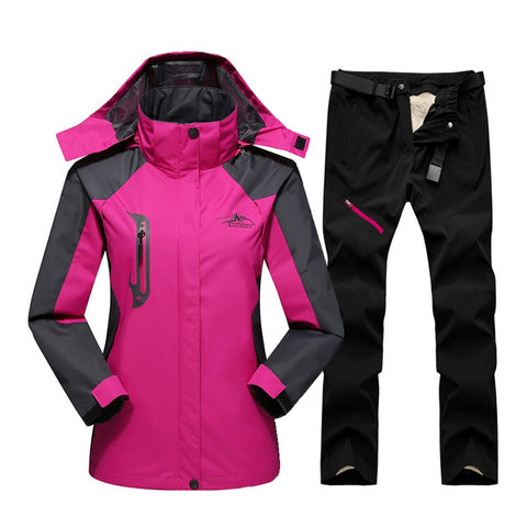 Chaqueta y pantalones de snowboard de invierno cálido para mujer